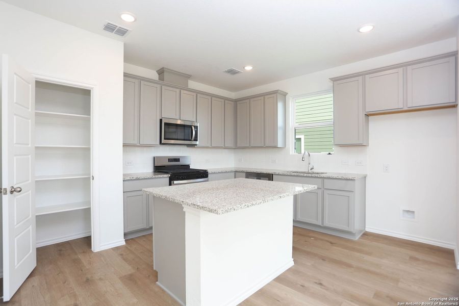 Furnished interior view inside a new home in Fairway Crossing 40s, San Antonio (Image 10).