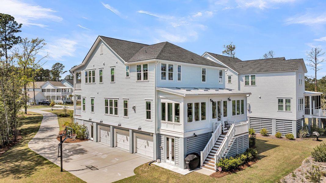 Front exterior of a new home in Carolina Park: Riverside, Mount Pleasant, SC, highlighting curb appeal (Image 24).