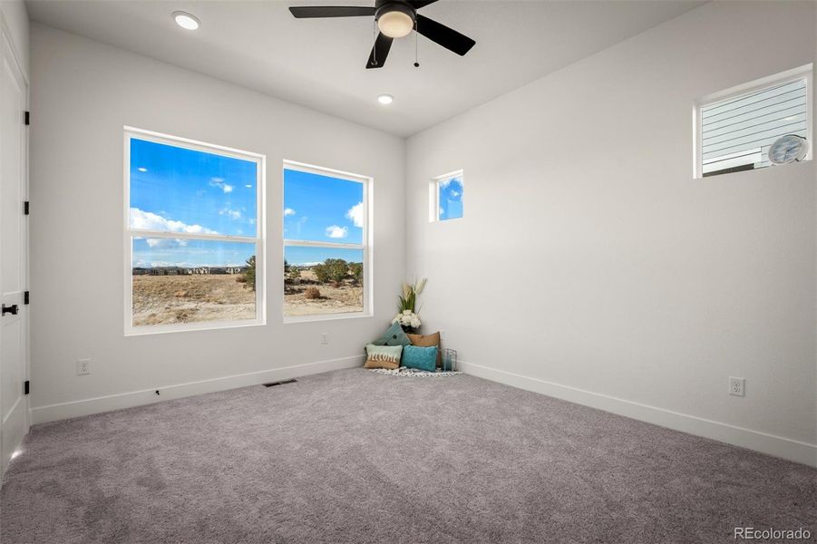 Spacious, unfurnished interior of a new home in Revel Crossing at Wolf Ranch - The Panorama Collection, Colorado Springs (Image 30).