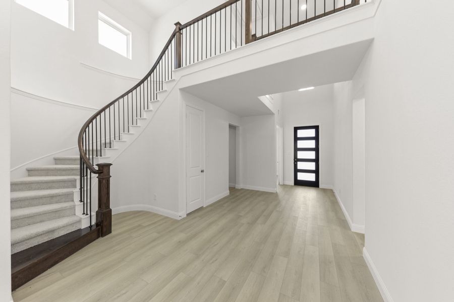 Spacious, unfurnished interior of a new home in The Reserve at Spiritas Ranch, Little Elm (Image 21). Spacious, unfurnished interior of a new home in The Reserve at Spiritas Ranch, Little Elm (Image 21).