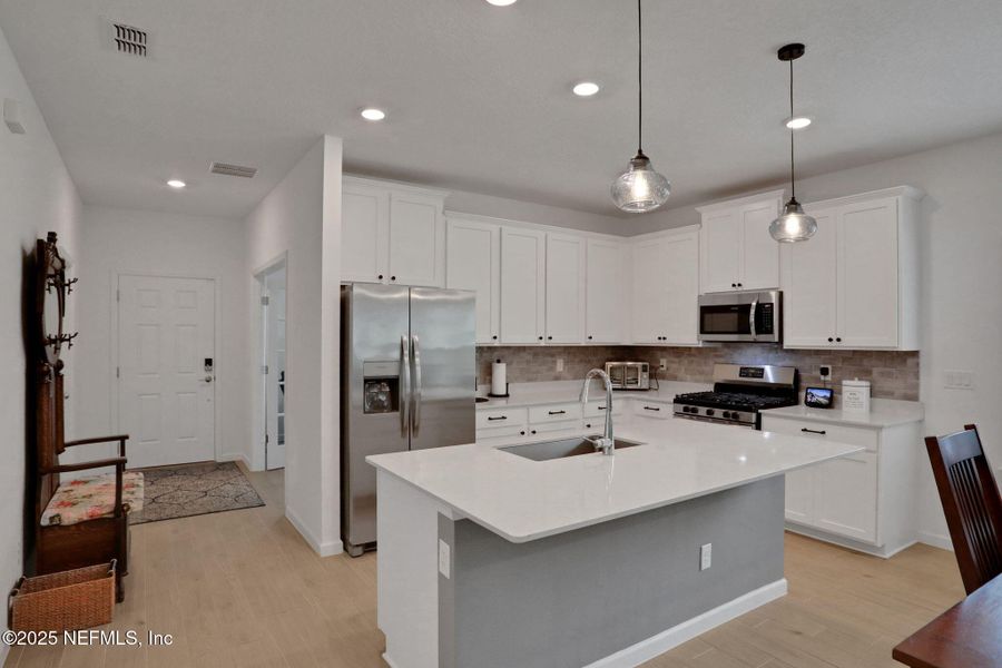 Furnished interior view inside a new home in Tributary: Lakeview at Tributary 50's, Yulee (Image 5).