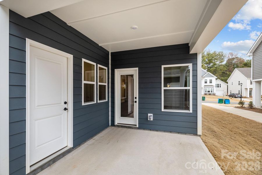 Exterior details and patio area of a home in Arbor Village, Matthews (Image 27).