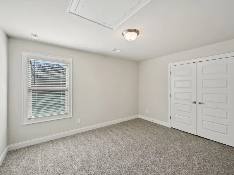 Spacious, unfurnished interior of a new home in Martin Springs - Cottage Series, Lawrenceville (Image 16).