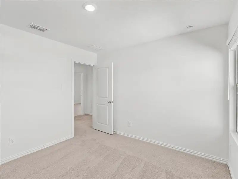 Spacious, unfurnished interior of a new home in Simpson Crossing - Spring Series, McKinney (Image 18).