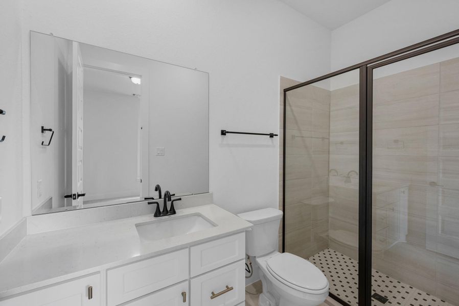 Furnished interior view inside a new home in Bridgeland, Cypress (Image 26).