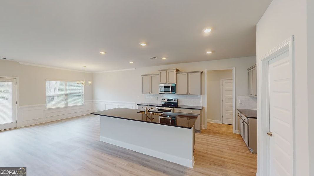 Furnished interior view inside a new home in Holliday Pass, Griffin (Image 9).