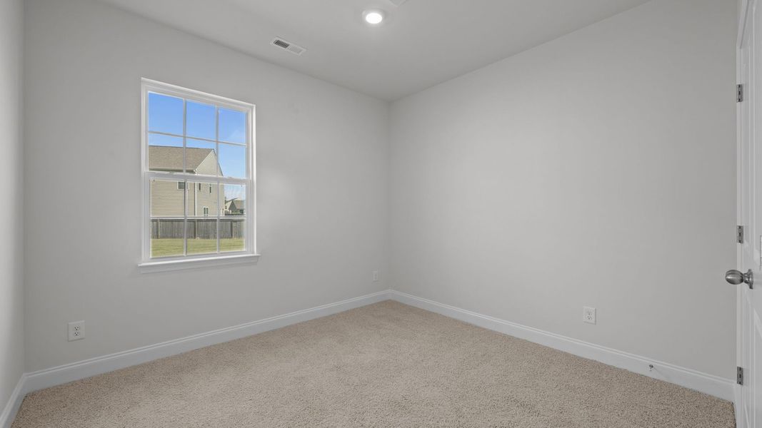 Spacious, unfurnished interior of a new home in Tyler - Home on the Lake, New Bern (Image 27).