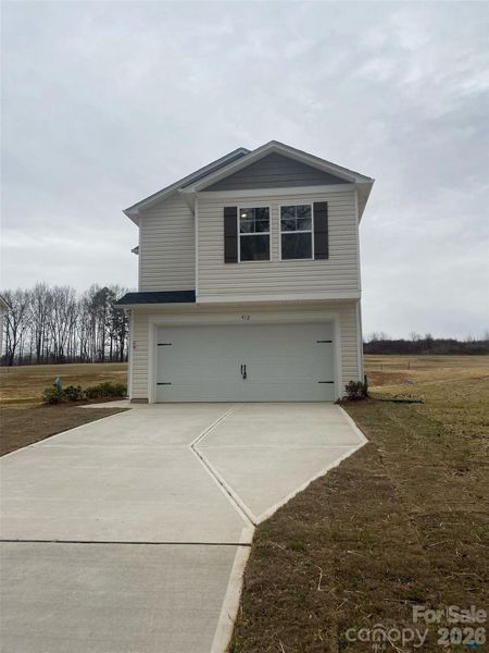 Front exterior of a new home in , Shelby, NC, highlighting curb appeal (Image 1). Front exterior of a new home in , Shelby, NC, highlighting curb appeal (Image 1).