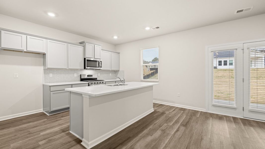 Representative furnished interior of a home built from the Galen by D.R. Horton in Preserve at Dove Creek, Statham (Image 4).