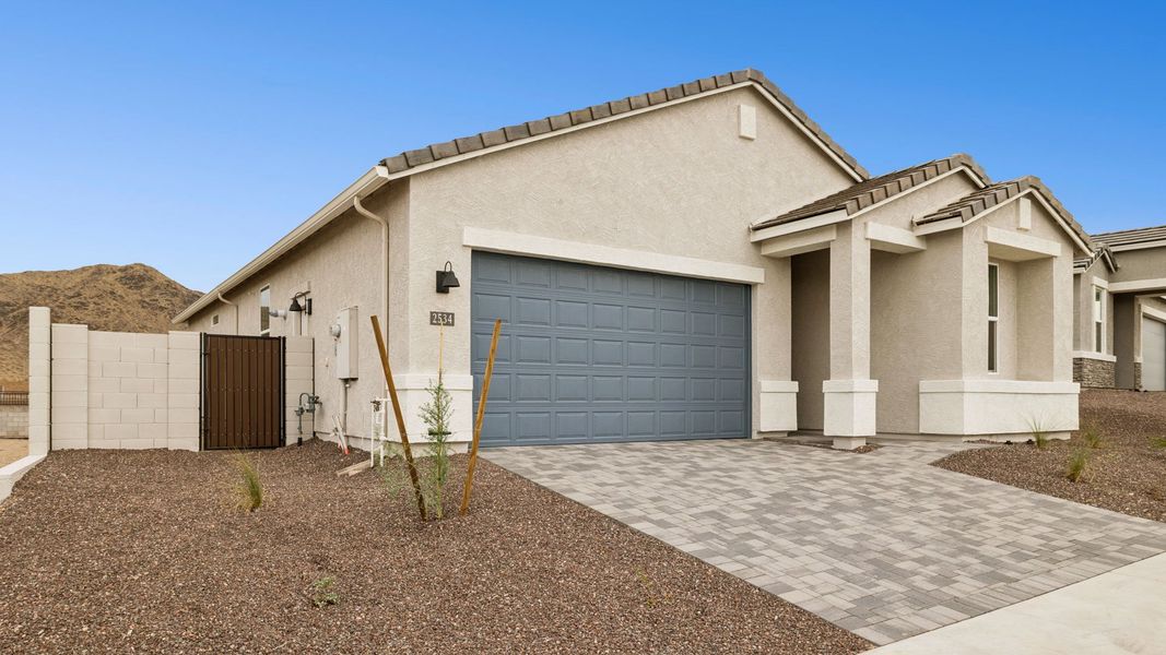 Front exterior of a new home in Upper Canyon, Phoenix, AZ, highlighting curb appeal (Image 20).