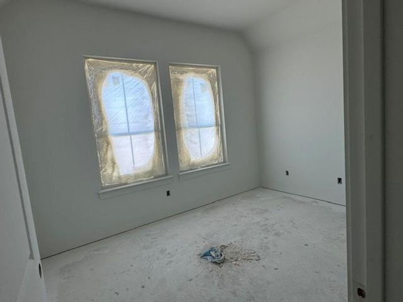 Two windows allow natural light into this well-appointed room, ready for custom finishes. Two windows allow natural light into this well-appointed room, ready for custom finishes.