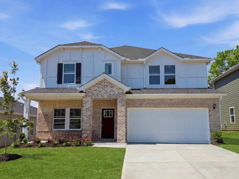 Front exterior of a new home in Crossing at Abner Creek, Greer, SC, highlighting curb appeal (Image 1). Front exterior of a new home in Crossing at Abner Creek, Greer, SC, highlighting curb appeal (Image 1).
