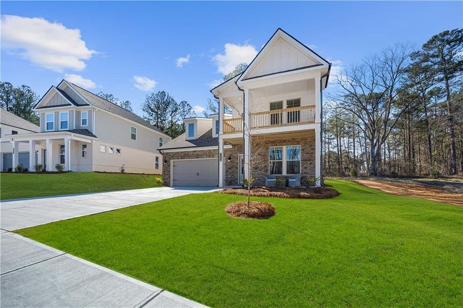 Front exterior of a new home in Hamilton Lakes, Lawrenceville, GA, highlighting curb appeal (Image 1). Front exterior of a new home in Hamilton Lakes, Lawrenceville, GA, highlighting curb appeal (Image 1).