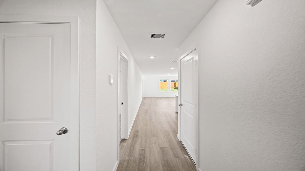 Representative unfurnished interior of a home built from the Anderson by D.R. Horton in Lexington Heights, Willis (Image 11). Representative unfurnished interior of a home built from the Anderson by D.R. Horton in Lexington Heights, Willis (Image 11).