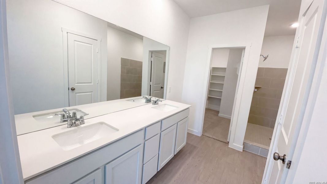 Furnished interior view inside a new home in Waterwheel, San Antonio (Image 9).