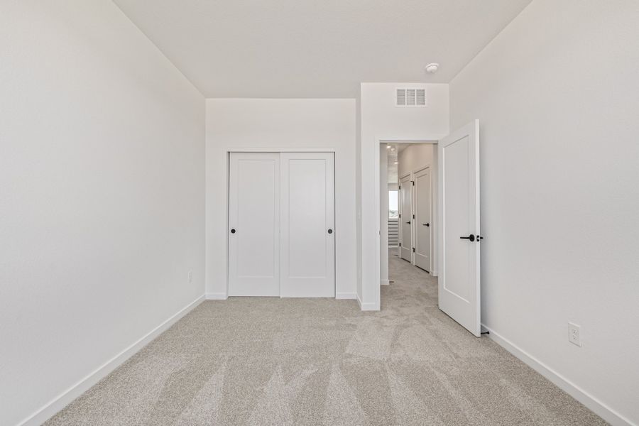 Spacious, unfurnished interior of a new home in Painted Prairie, Aurora (Image 21).