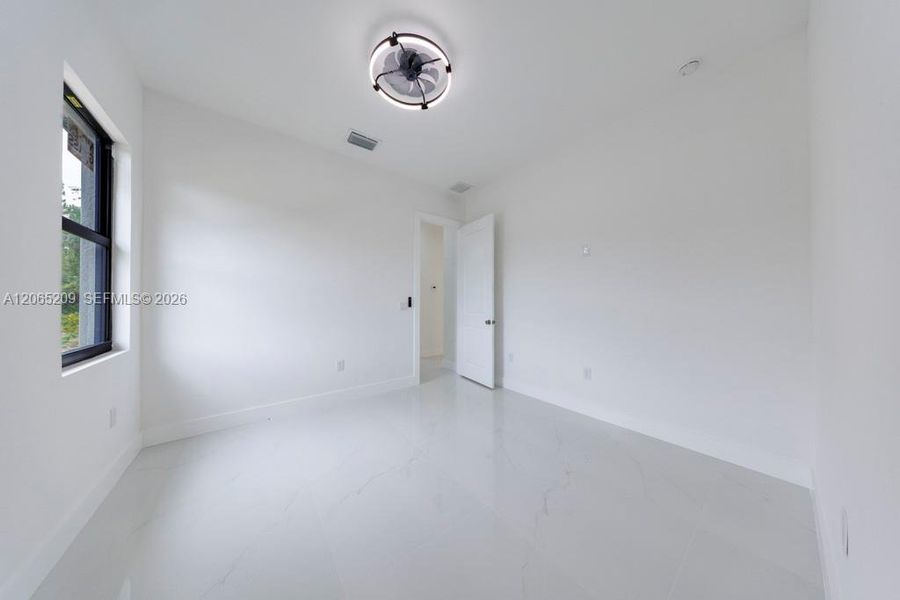 Spacious, unfurnished interior of a new home in , Lehigh Acres (Image 72).