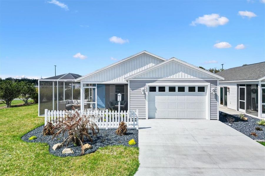 Front exterior of a new home in , The Villages, FL, highlighting curb appeal (Image 22). Front exterior of a new home in , The Villages, FL, highlighting curb appeal (Image 22).