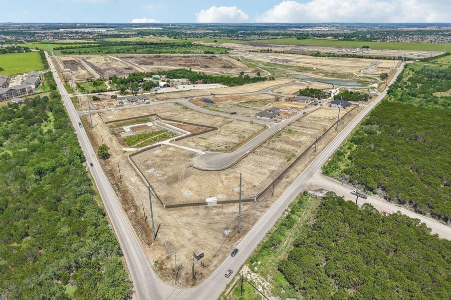 Prime development opportunity with roads and utilities in place, surrounded by lush natural land.