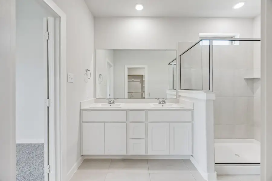 Primary Bathroom in the Stanley II home plan by Trophy Signature Homes – REPRESENTATIVE PHOTO Primary Bathroom in the Stanley II home plan by Trophy Signature Homes – REPRESENTATIVE PHOTO