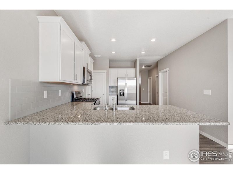 Furnished interior view inside a new home in Silver Peaks, Lochbuie (Image 8).