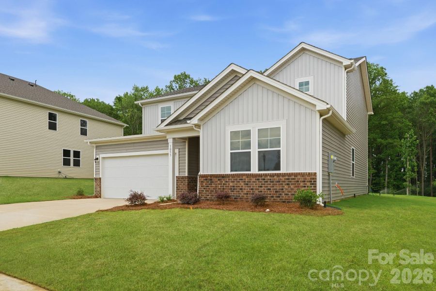 Front exterior of a new home in Carpenter Farms, Lincolnton, NC, highlighting curb appeal (Image 2). Front exterior of a new home in Carpenter Farms, Lincolnton, NC, highlighting curb appeal (Image 2).