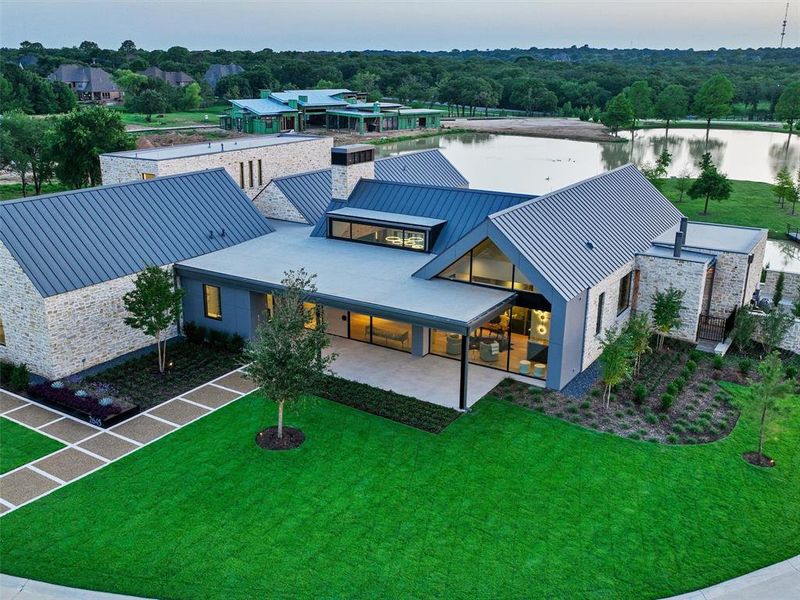 Front exterior of a new home in , Westlake, TX, highlighting curb appeal (Image 1).