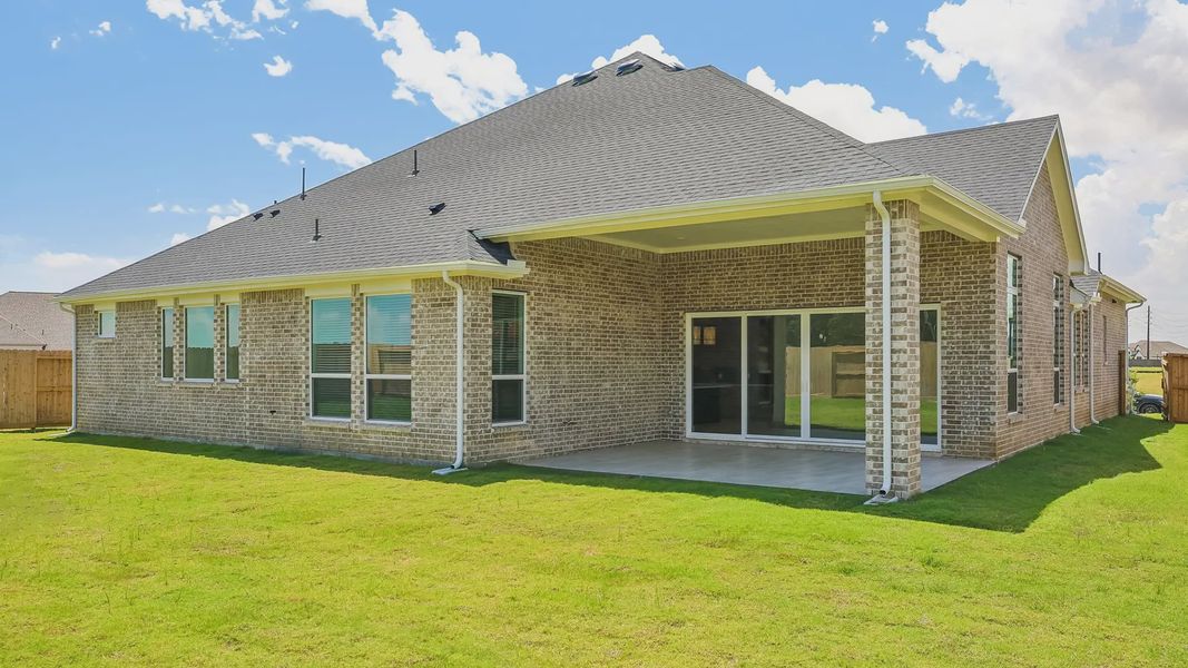 Exterior details and patio area of a home in Riceland 60',65',70', Mont Belvieu (Image 26).
