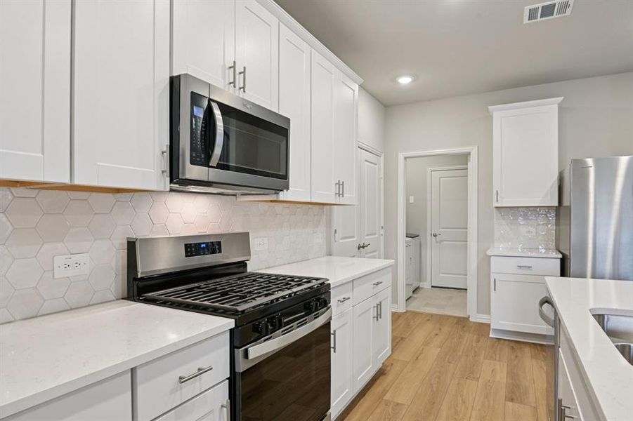 Photo is not of the actual home, but is an inspirational photo of builder’s model home and may depict options, furnishings, and/or decorator features that are not included.