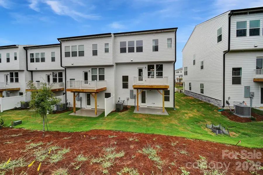 Exterior details and patio area of a home in , Concord (Image 3).
