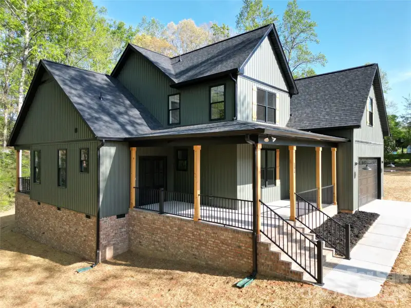 Exterior details and patio area of a home in , Statesville (Image 28).
