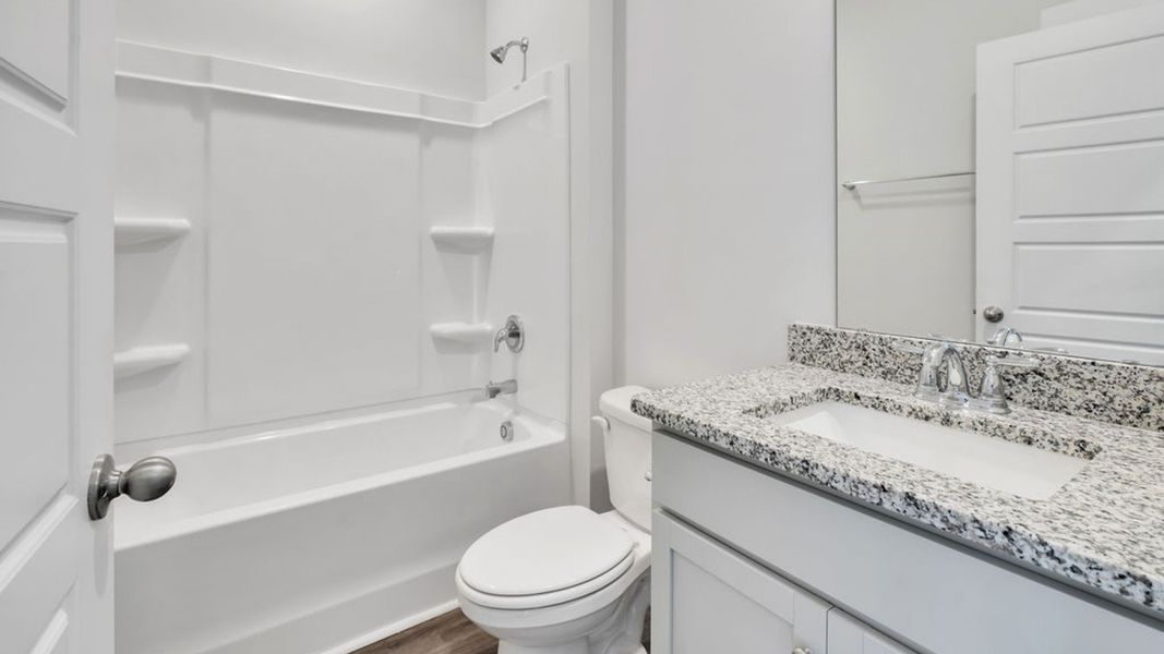 Representative furnished interior of a home built from the ACADIA by D.R. Horton in Rolling Hills, Bolivia (Image 8).