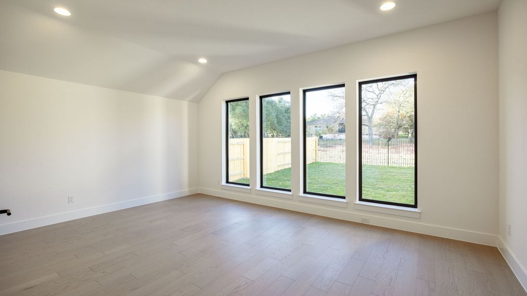 Spacious, unfurnished interior of a new home in Parkside On The River West 70'/80', Georgetown (Image 20).