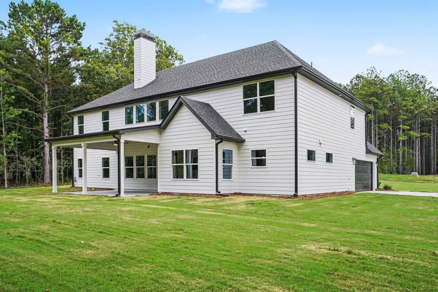 Exterior details and patio area of a home in Flint Farms, Concord (Image 31).