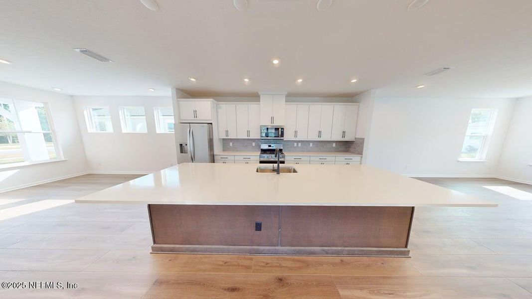 Furnished interior view inside a new home in RiverTown - WaterSong, St. Johns (Image 5).