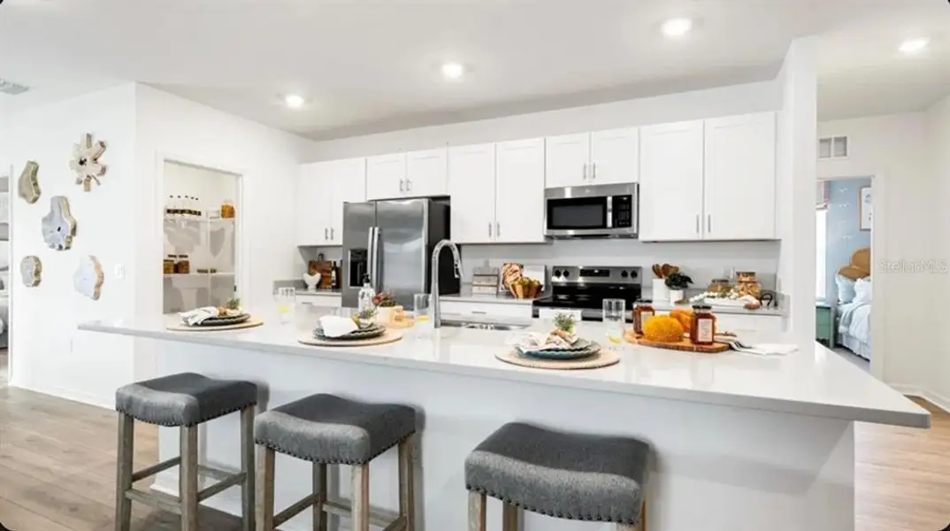 Furnished interior view inside a new home in Westview, Kissimmee (Image 10).