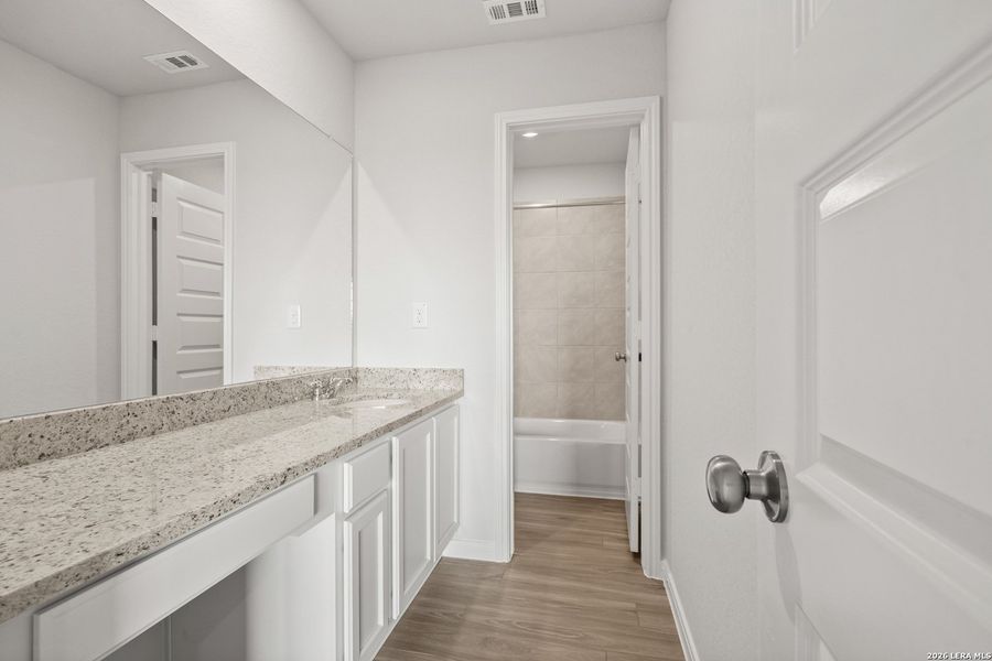 Furnished interior view inside a new home in Abbott Place, St. Hedwig (Image 7).