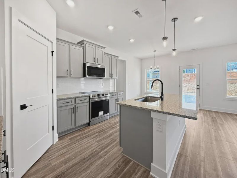 Furnished interior view inside a new home in Charlotte's Ridge, Middlesex (Image 8).