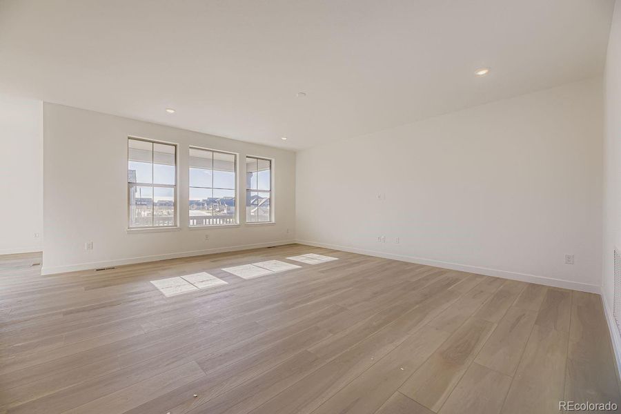 Spacious, unfurnished interior of a new home in Red Rocks Ranch: The Monarch Collection, Morrison (Image 9).