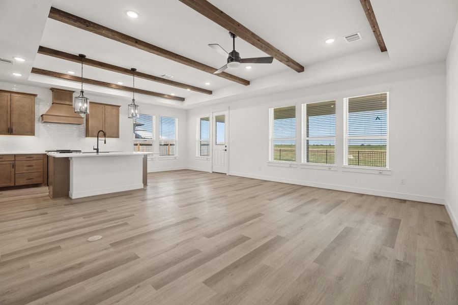 Impressive Family room with stained beams, soaring high ceiling, and space galore! Impressive Family room with stained beams, soaring high ceiling, and space galore!