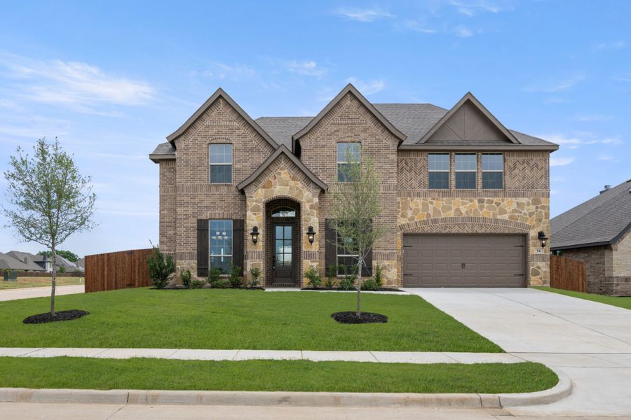 Front exterior of a new home in Mockingbird Hills, Joshua, TX, highlighting curb appeal (Image 31).