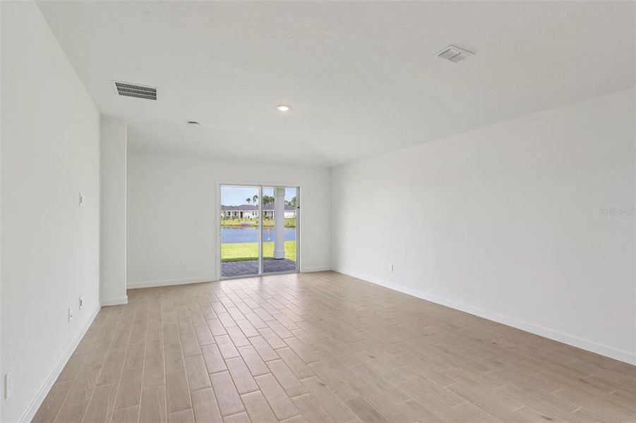 Spacious, unfurnished interior of a new home in Colbert Landings, Palm Coast (Image 22).