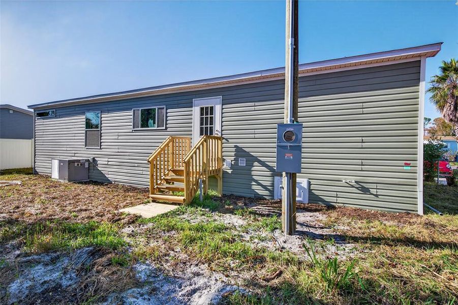 Exterior details and patio area of a home in , Ormond Beach (Image 14).