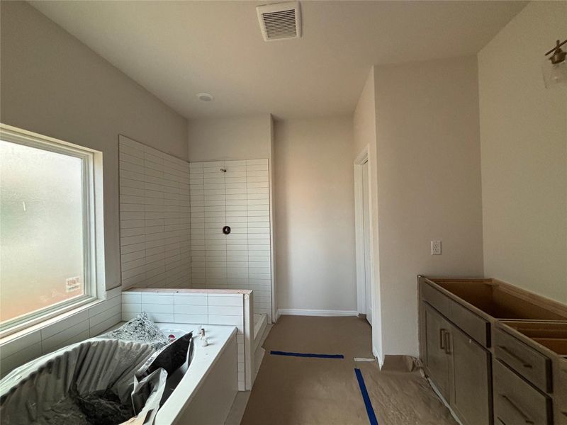 Furnished interior view inside a new home in Covered Bridge, Hutto (Image 4). Furnished interior view inside a new home in Covered Bridge, Hutto (Image 4).