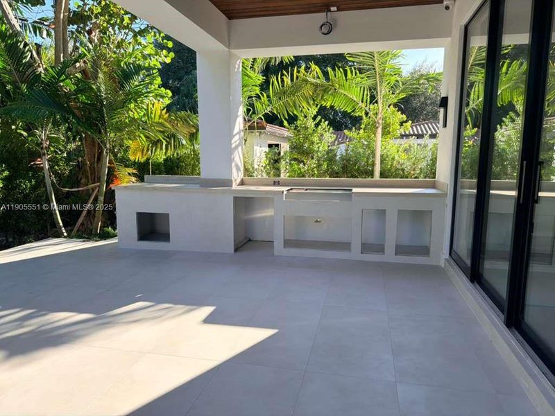 Exterior details and patio area of a home in , Coral Gables (Image 7). Exterior details and patio area of a home in , Coral Gables (Image 7).