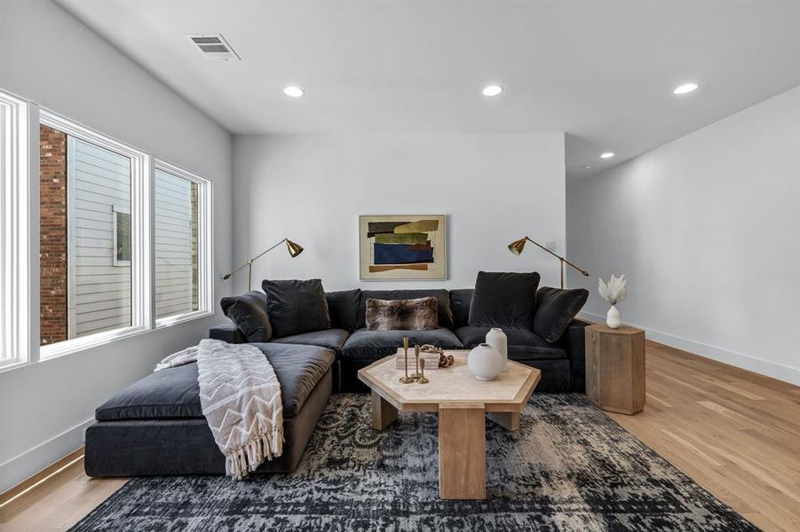 Living room featuring wood-type flooring