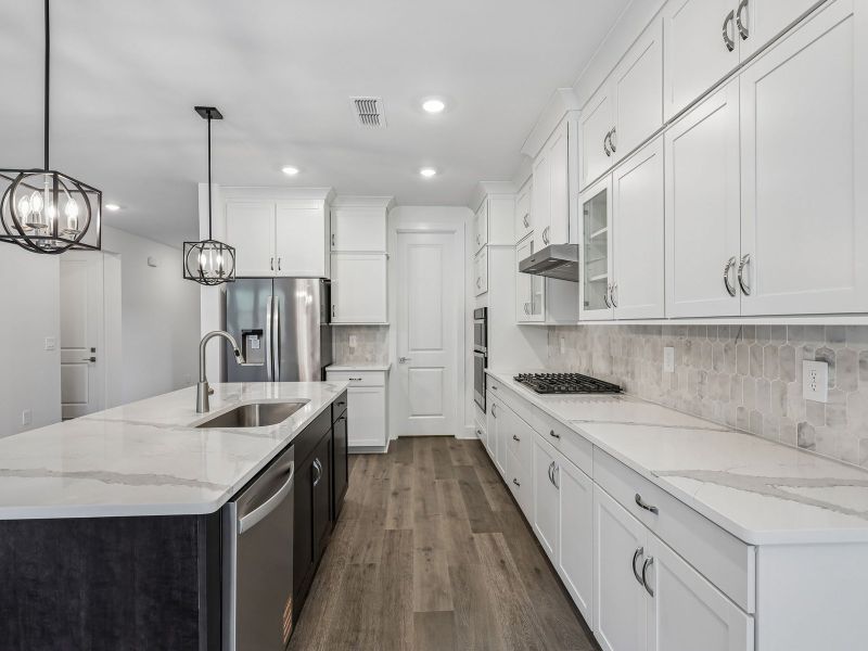 Furnished interior view inside a new home in Station Hill - Estate Series, Franklin (Image 4).