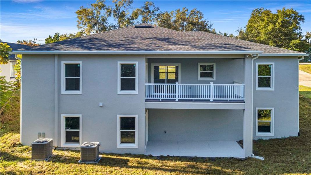 Front exterior of a new home in , Deltona, FL, highlighting curb appeal (Image 1). Front exterior of a new home in , Deltona, FL, highlighting curb appeal (Image 1).