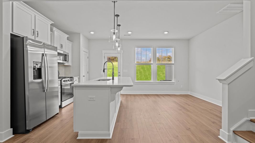 Notable 9-foot island provides generous prep and gathering space in this thoughtfully designed kitchen Notable 9-foot island provides generous prep and gathering space in this thoughtfully designed kitchen