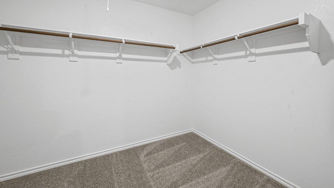 Representative unfurnished interior of a home built from the Texas Cali by D.R. Horton in Bel Air Village, Sherman (Image 13).